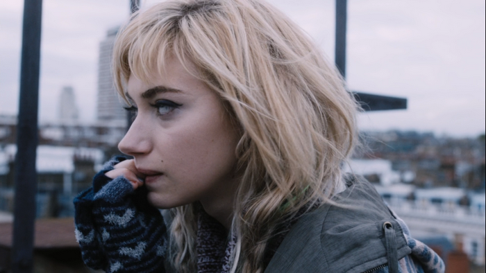 Imogen Poots looking to the side