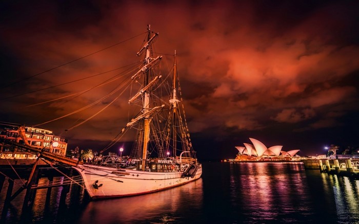 Sydney Opera House with Sailing Ship at Night