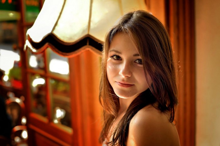 Young woman with brown hair and eyes, portrait
