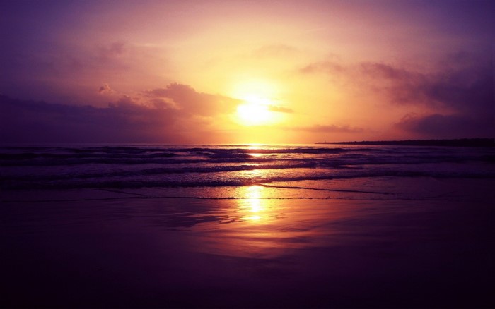 Sunset Over Calm Ocean Waves