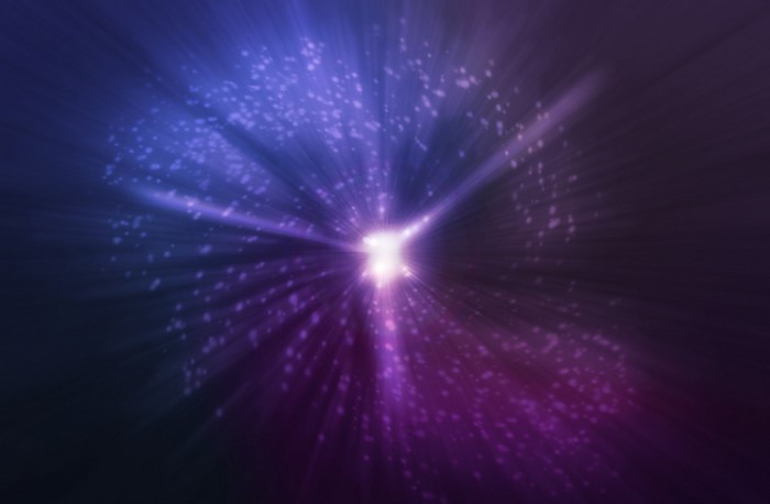 Abstract purple and blue light burst with particles