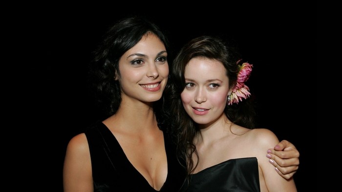 Morena Baccarin and Summer Glau in black dresses