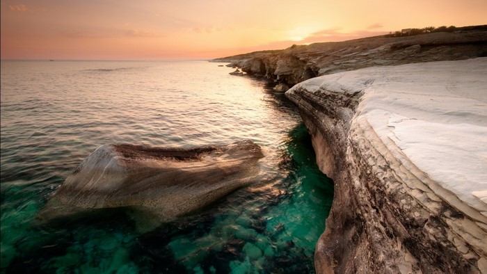 Sunset over the rocky coast of Cyprus