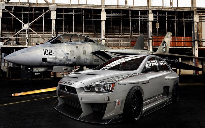 Mitsubishi Lancer Evolution and F-14 Tomcat fighter jet