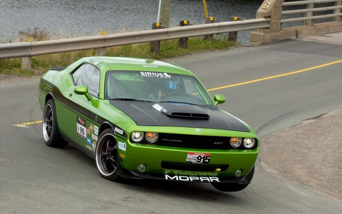 Green Dodge Challenger SRT with Mopar and Sirius branding