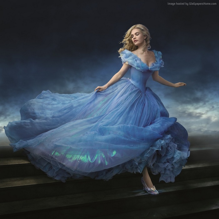 Cinderella in a blue dress on stairs