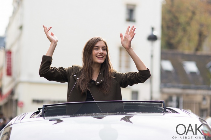 Ronja Furrer in a car with arms raised