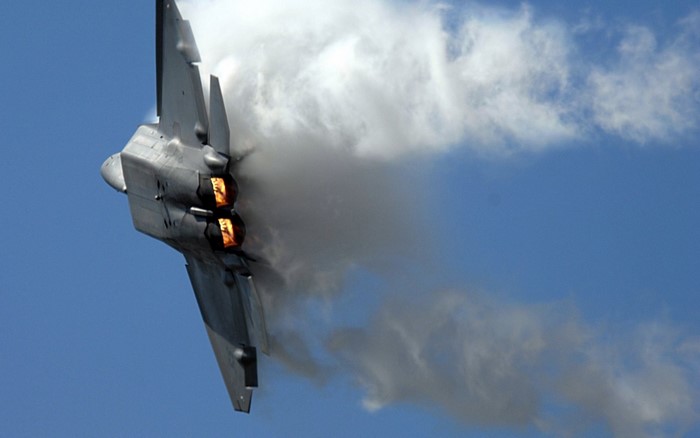 F-22 Raptor performing aerobatics with engine exhaust