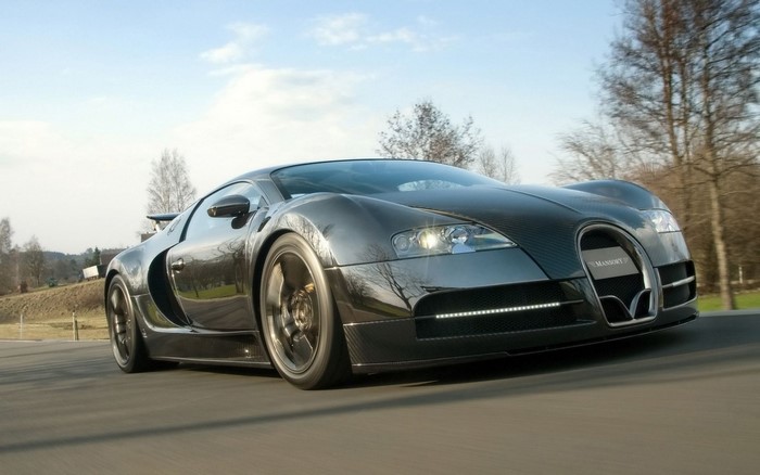 Mansory Bugatti Veyron driving on a road