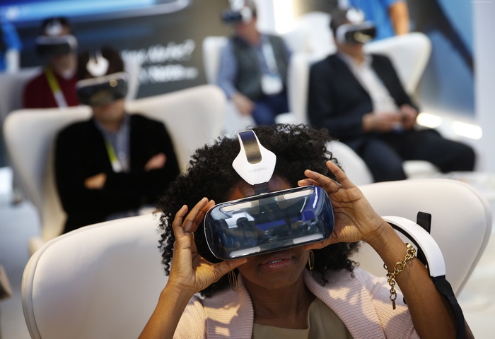 Woman using Samsung Gear VR headset
