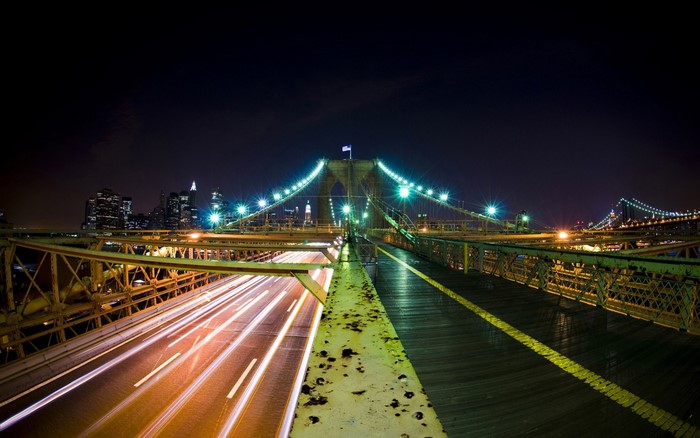 Brooklyn Bridge at Night with New York City Skyline