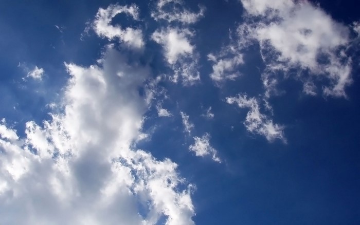 Blue sky with cumulus clouds