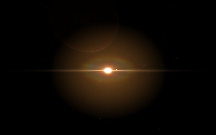 Sun and planets in outer space with lens flare
