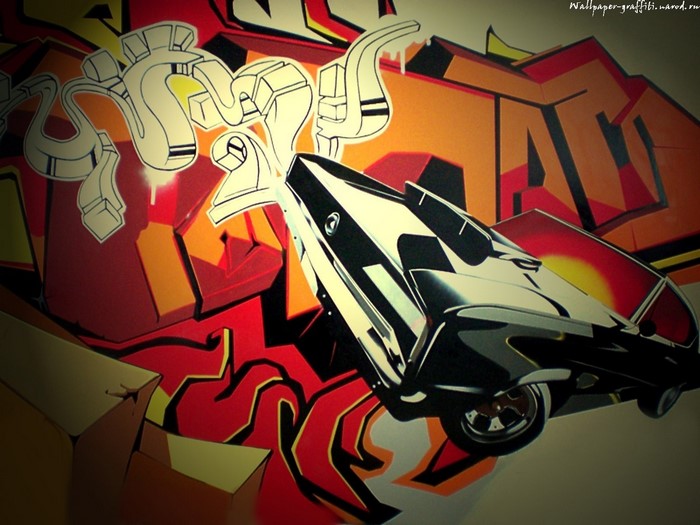 Graffiti art with a futuristic car and abstract shapes