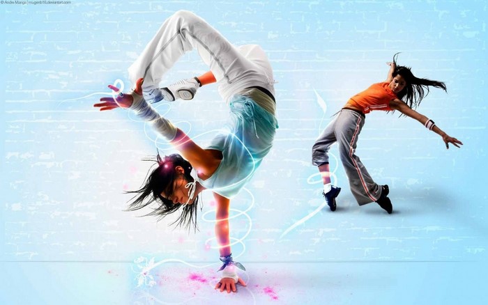 Two women breakdancing with glowing effects