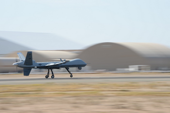MQ-9 Reaper drone landing on a runway