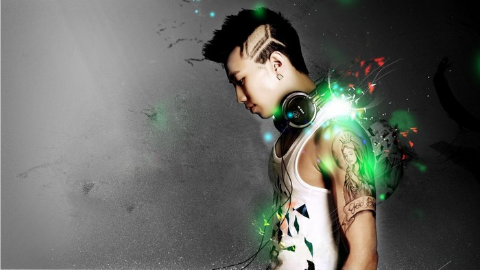 Man with headphones and tattoos