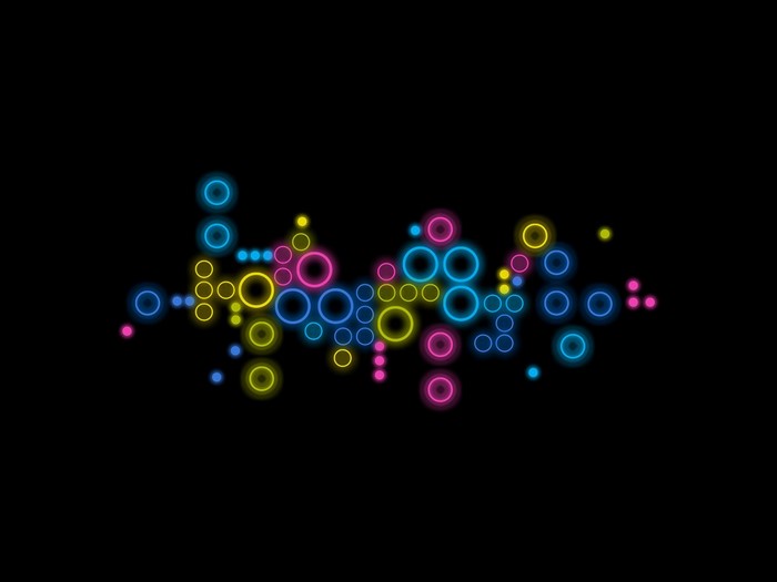 Abstract glowing circles and dots on black background