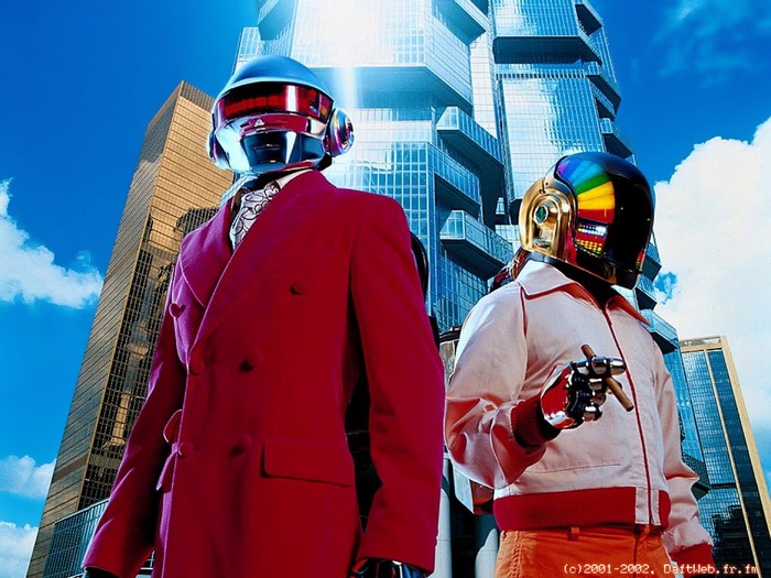 Daft Punk robots in front of skyscrapers