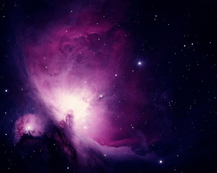 Purple and white nebula in outer space with stars