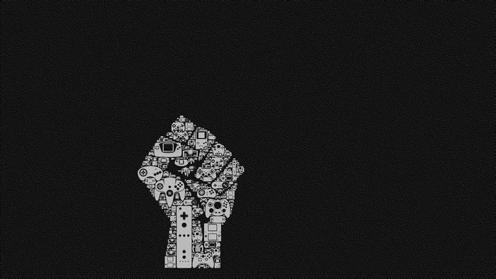 Fist made of video game controllers and consoles
