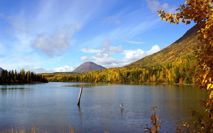 Autumn lake with mountains and trees