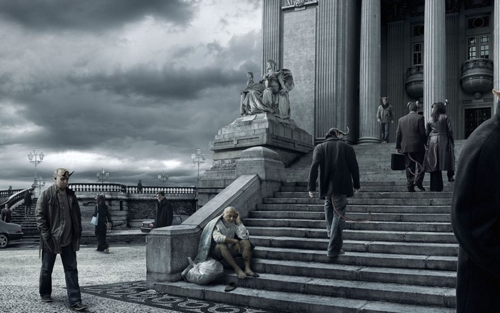 Demons with horns on stairs of a monument