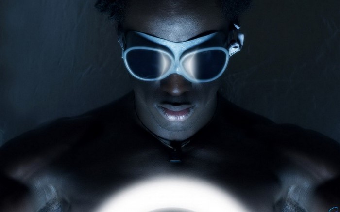 Man wearing futuristic goggles with glowing light