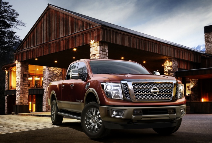 Nissan Titan XD truck parked in front of a lodge