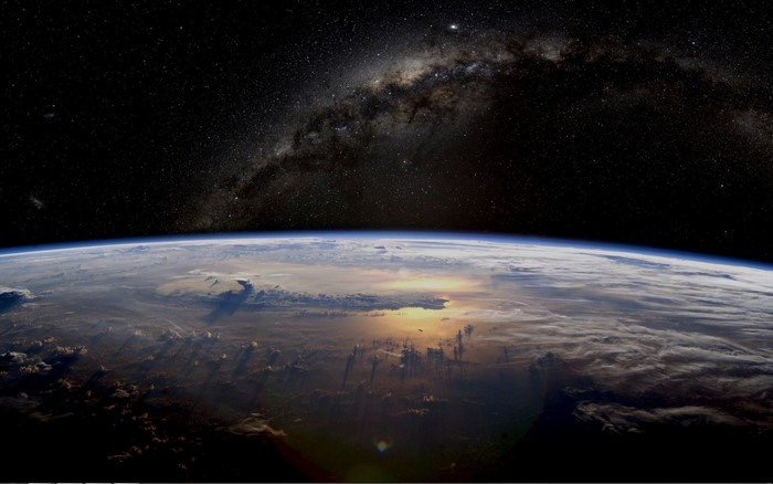 Earth and the Milky Way galaxy from space