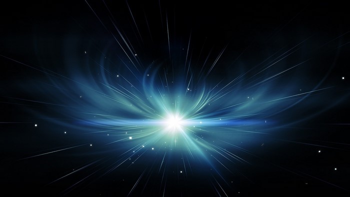 Abstract blue light explosion in dark space