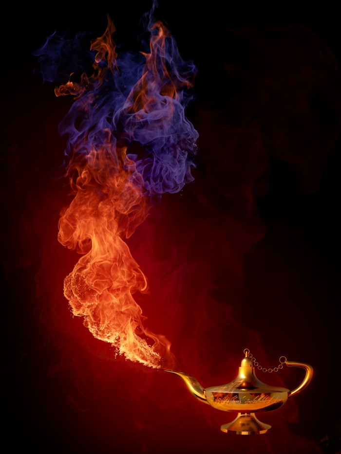 Golden genie lamp emitting orange and blue fire