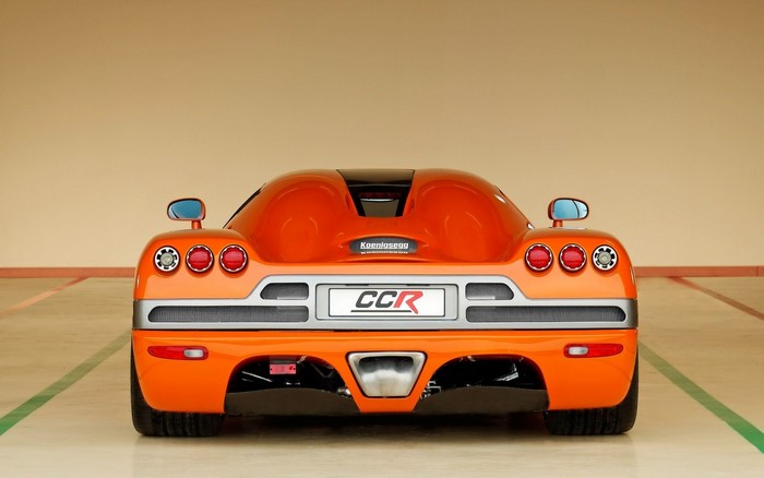 Orange Koenigsegg CCR sports car rear view