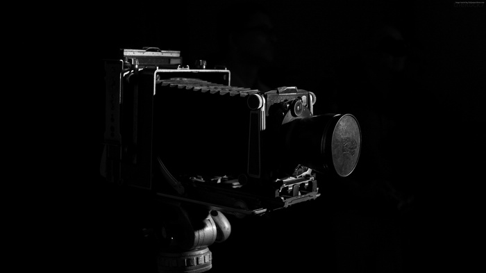 Vintage Schneider Kreuznach bellows camera on tripod