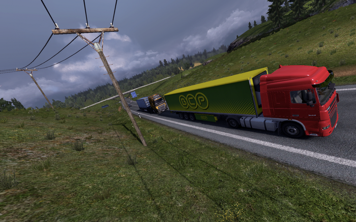 Euro Truck Simulator 2 screenshot with trucks on a highway