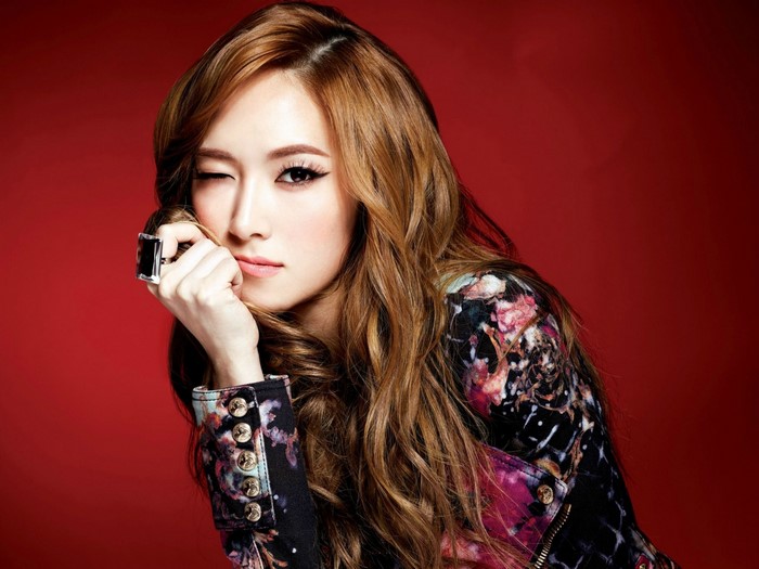 Jessica Jung winks with a ring on her finger