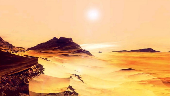 Desert landscape with mountains under a bright sun