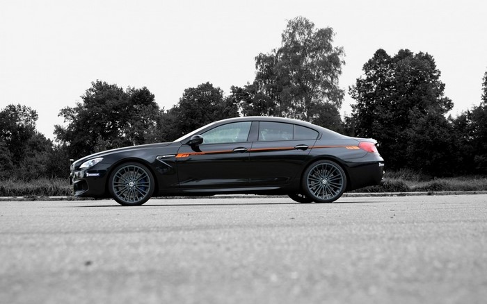 Black BMW M6 Gran Coupe with orange accents