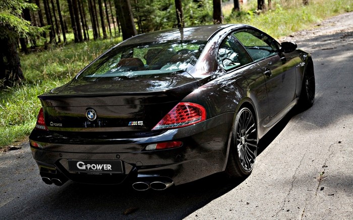 Black BMW M6 G-Power Coupe on a Forest Road