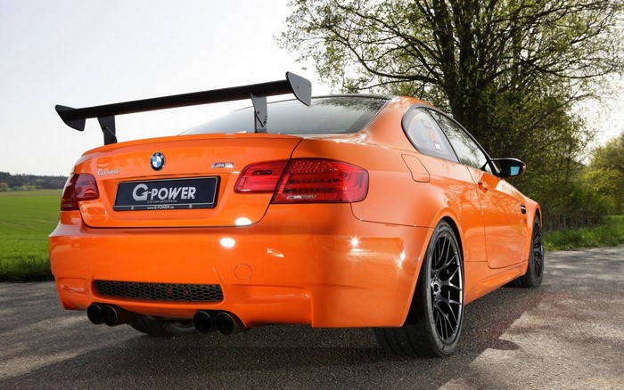 Orange BMW M3 GTS by G-Power with large rear spoiler