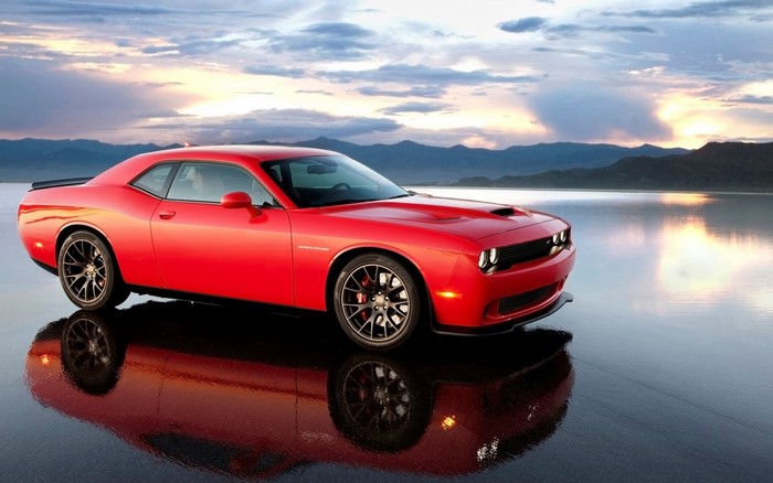 Red Dodge Challenger SRT Muscle Car at Sunset