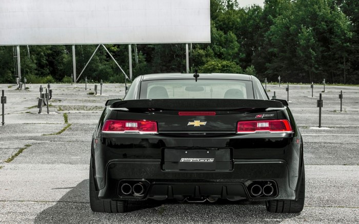 Black Chevrolet Camaro Z28 at a Drive-in Theater
