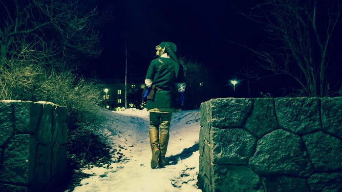Link from The Legend of Zelda in a snowy park at night