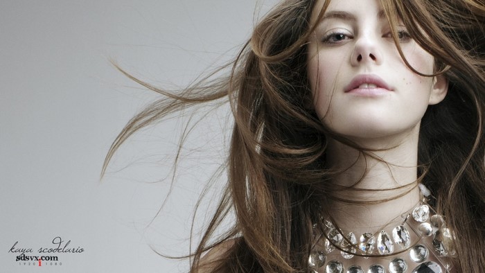 Kaya Scodelario portrait with flowing brown hair