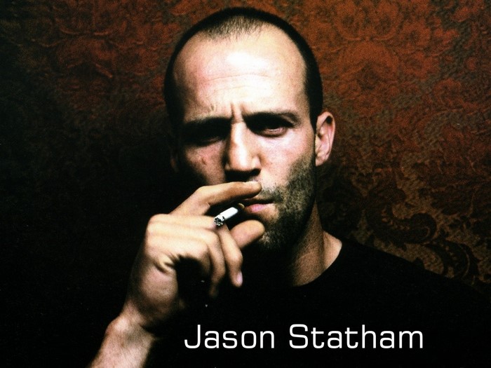 Jason Statham smoking a cigarette