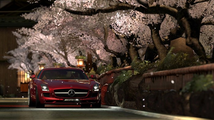 Mercedes-Benz SLS AMG driving through cherry blossoms