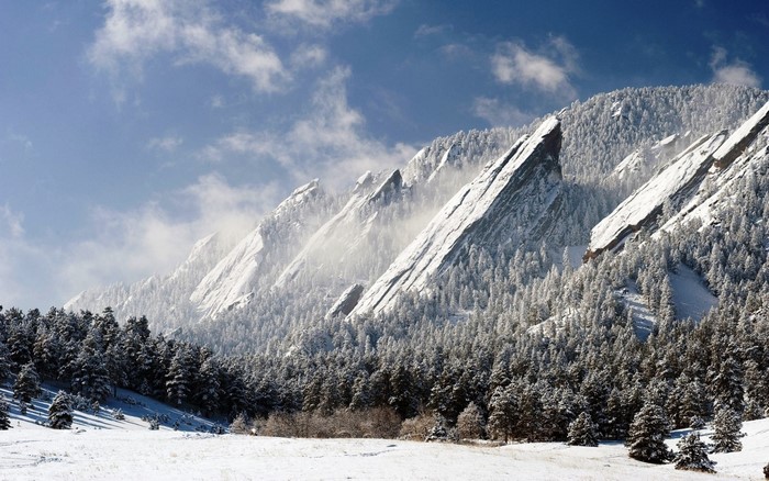 Snow-covered Flatirons mountains in Boulder, Colorado
