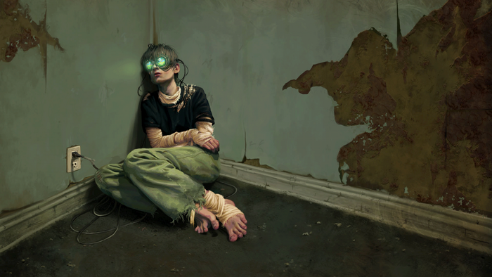 Person with VR goggles in a dark room