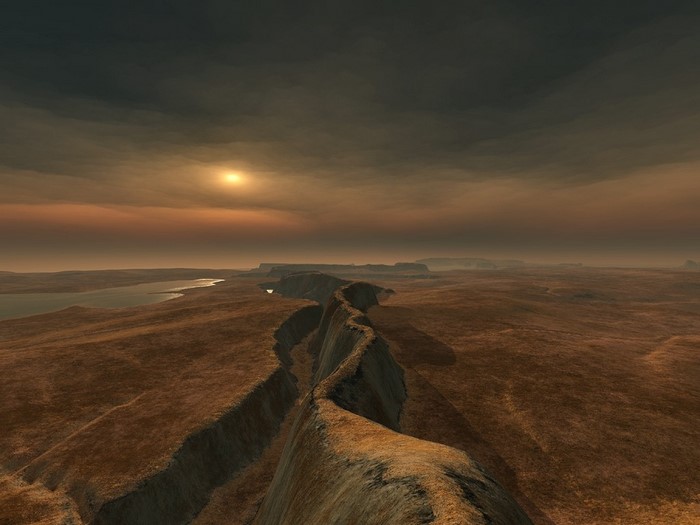 Alien landscape with a canyon and a lake at sunset