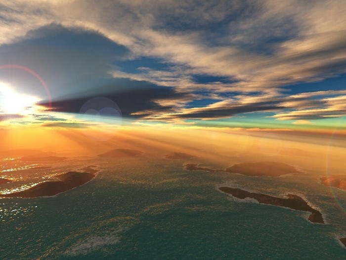 Sunset over islands and ocean with dramatic clouds
